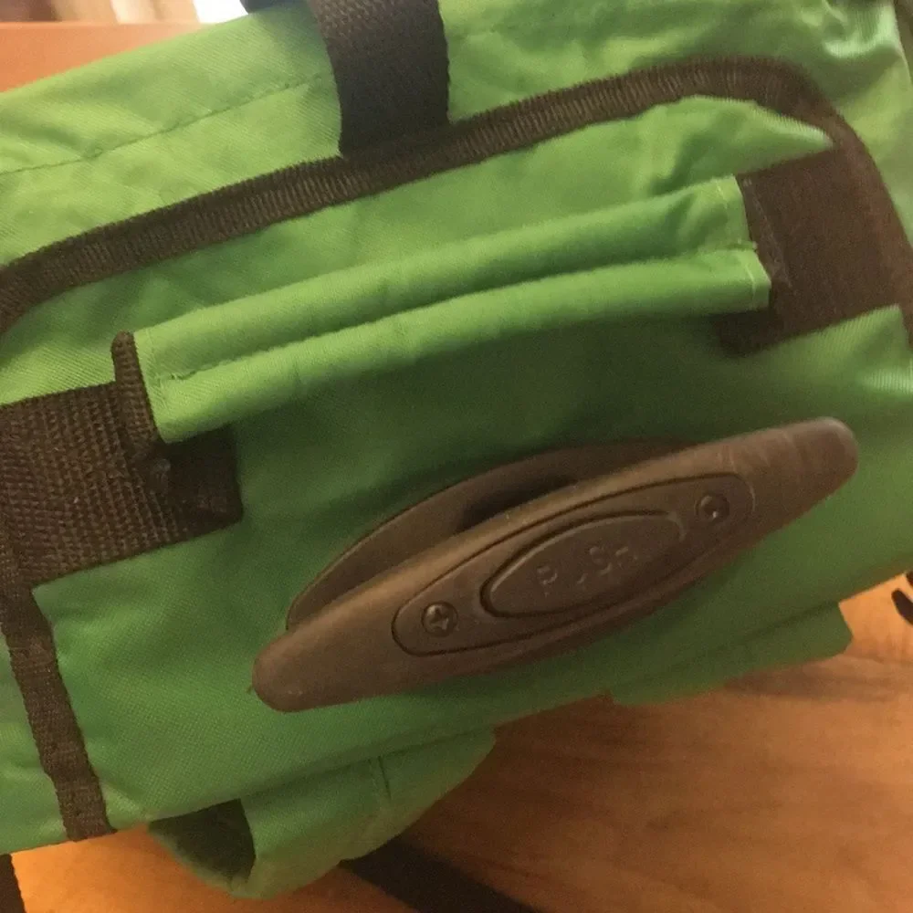 Jameson Green Travel Backpack with wheels and a retractable handle